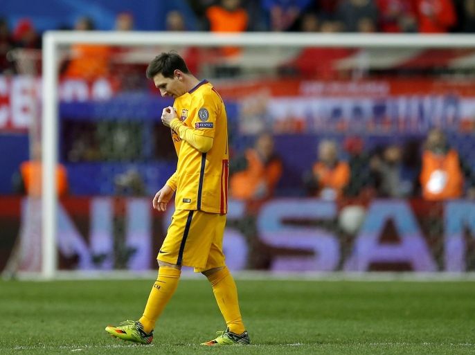 Barcelona's Lionel Messi walks on the pitch during the Champions League 2nd leg quarterfinal soccer match between Atletico Madrid and Barcelona at the Vicente Calderon stadium in Madrid, Spain, Wednesday April 13, 2016. Atletico defeated Barcelona by 2-0. (AP Photo/Paul White)