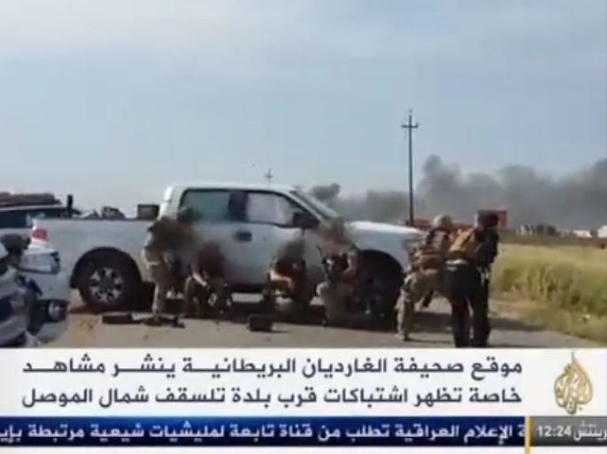جانب من اشتباكات بين قوات البشمركة والقوات الأميركية وبين تنظيم الدولة الإسلامية شمال مدينة الموصل