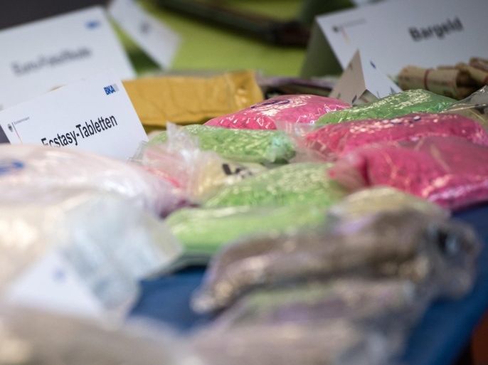 Plastic bags filled with Cocain, Cannabis and Ecstasy pills lie on a table at the German Federal Criminal Police Office (BKA) in Wiesbaden, Germany, 29 February 2016. Several pieces of evidence were seized and nine people arrested across Europe during the large-scale raid on Monday, The BKA and the Central Office for Combating Internet Crime (Zentralstelle zur Bekämpfung der Internetkriminalität) (ZIT) announced. The illegal sites on the web's so-called darknet offer a