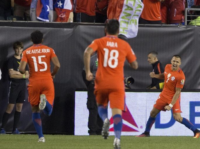 Jun 14, 2016; Philadelphia, PA, USA; Chile forward Alexis Sanchez (7) reacts with midfielder Jean Beausejour (15) and defender Gonzalo Jara (18) after scoring against Panama during the second half in the group play stage of the 2016 Copa America Centenario at Lincoln Financial Field. Chile won 4-2. Mandatory Credit: Bill Streicher-USA TODAY Sports