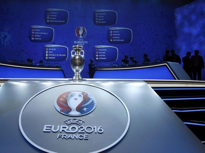 Football Soccer - Euro 2016 draw - Palais des Congres, Paris, France - 12/12/15 Euro 2016 trophy is on display with the results of the draw in the background REUTERS/Charles Platiau