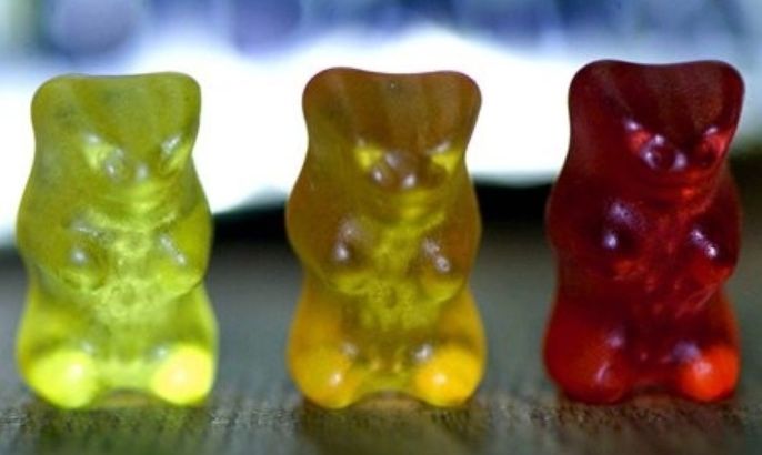FILE- This march 15, 2001 file photo shows three gelatine gummi bears pictured at the Haribo company in Linz, Austria."The worst kind of candy for braces is the sticky, chewy kind. Bubble gum. Sour Patch Kids," said Dr. Olga Bukholts, director of Perfect Smiles Orthodontics in New York."They stick to the brace and pull it off with every chewing stroke. Every time a brace or bracket is broken, it sets the treatment a step back."
