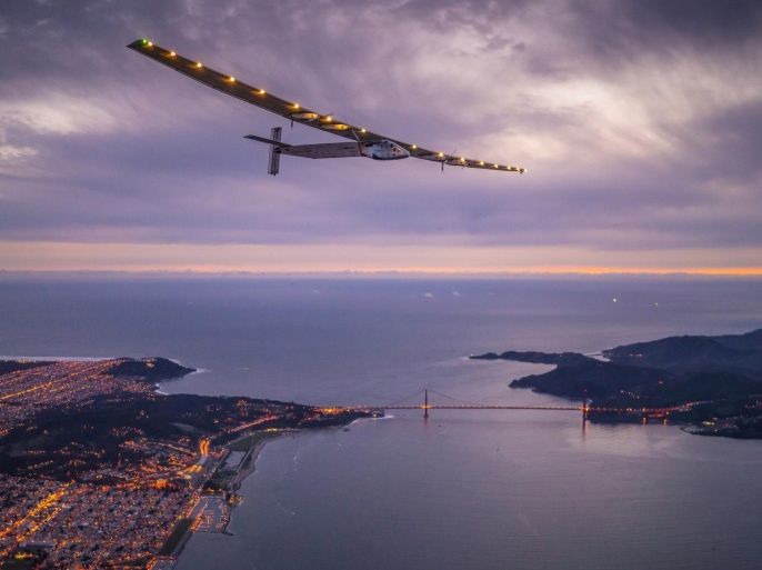 "Solar Impulse 2", a solar-powered plane piloted by Bertrand Piccard of Switzerland, flies over the Golden Gate bridge in San Francisco, California, U.S. April 23, 2016, before landing on Moffett Airfield following a 62-hour flight from Hawaii. Jean Revillard/Solar Impulse/Handout via REUTERS/File Photo ATTENTION EDITORS - THIS IMAGE WAS PROVIDED BY A THIRD PARTY. EDITORIAL USE ONLY