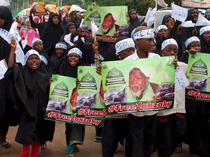 Children of members of the Islamic movement in Nigeria carry banners and shout slogans during a protest against the detention of the leader of Shi'ites in Nigeria, Sheik Ibraheem El-Zakzaky, in Kaduna, Nigeria March 14, 2016. REUTERS/Stringer EDITORIAL USE ONLY. NO RESALE. NO ARCHIVES.