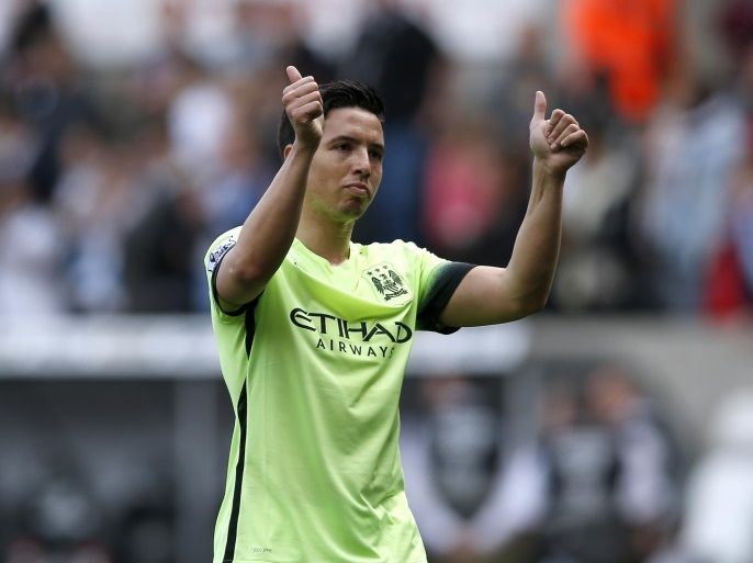 Britain Soccer Football - Swansea City v Manchester City - Barclays Premier League - Liberty Stadium - 15/5/16 Manchester City's Samir Nasri acknowledges fans at the end of the match Action Images via Reuters / Peter Cziborra Livepic EDITORIAL USE ONLY. No use with unauthorized audio, video, data, fixture lists, club/league logos or "live" services. Online in-match use limited to 45 images, no video emulation. No use in betting, games or single club/league/player publi
