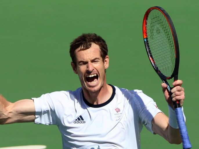 2016 Rio Olympics - Tennis - Semifinal - Men's Singles Semifinals - Olympic Tennis Centre - Rio de Janeiro, Brazil - 13/08/2016. Andy Murray (GBR) of Britain celebrates after winning match against Kei Nishikori (JPN) of Japan. REUTERS/Kevin Lamarque TPX IMAGES OF THE DAY. FOR EDITORIAL USE ONLY. NOT FOR SALE FOR MARKETING OR ADVERTISING CAMPAIGNS.