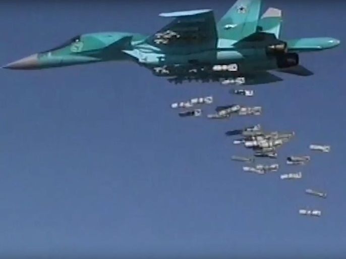 A handout still image taken from video footage made available on 18 August 2016 on the official website of the Russian Defence Ministry shows a Russian Sukhoi Su-34 fighter-bomber based at Hamedan airbase in Iran releasing its payload while carrying out airstrikes against the IS terrorist targets in the Deir ez-Zor province, North East of Damascus, Syria. EPA/RUSSIAN DEFENCE MINISTRY PRESS SERVICE / HANDOUT