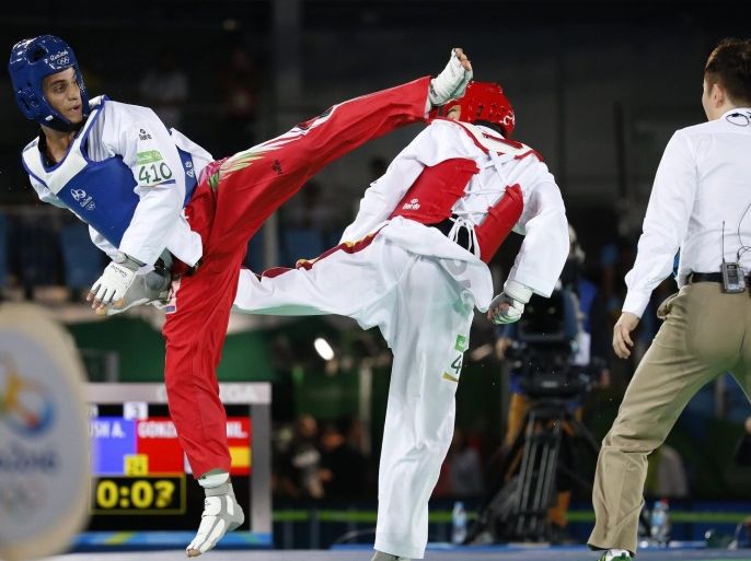 Ahmad Abughaush of Jordan (blue) and Joel Gonzalez Bonilla of Spain (red) in action a men's -68kg semi finals bout of the Rio 2016 Olympic Games Taekwondo events at the Carioca Arena 3 in the Olympic Park in Rio de Janeiro, Brazil, 18 August 2016.