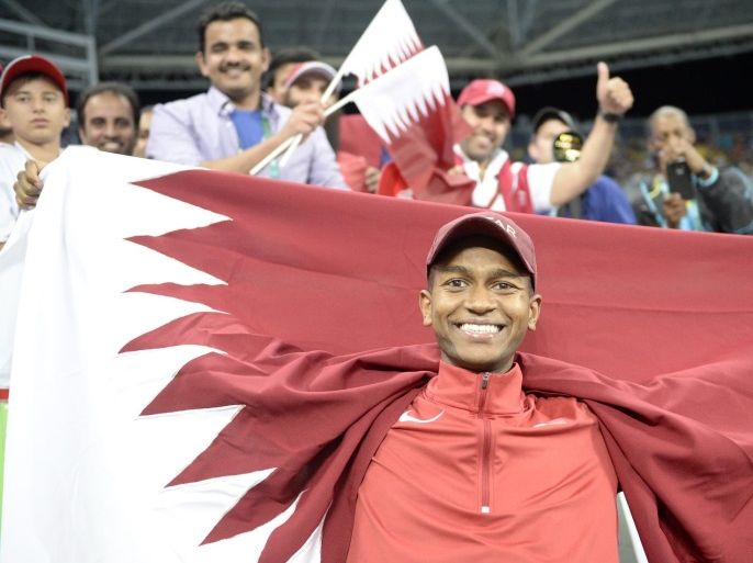 Mutaz Essa Barshim of Qatar celebrates after winning silver in the men's High Jump final of the Rio 2016 Olympic Games Athletics, Track and Field events at the Olympic Stadium in Rio de Janeiro, Brazil, 16 August 2016.