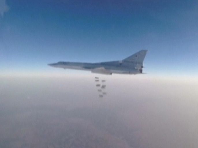 A still image, taken from video footage and released by Russia's Defence Ministry on August 11, 2016, shows a Russian Tupolev Tu-22M3 long-range bomber dropping off bombs at an unknown location in Syria. Ministry of Defence of the Russian Federation/Handout via REUTERS ATTENTION EDITORS - THIS IMAGE WAS PROVIDED BY A THIRD PARTY. EDITORIAL USE ONLY. NO RESALES. NO ARCHIVES.