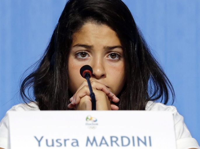 Syrian swimmer Yusra Mardini attends a press conference of the Olympic refugee team prior to the Rio 2016 Olympic Games in Rio de Janeiro, Brazil, 30 July 2016. Ten refugee athletes including two Syrian swimmers will form a team set to compete in the Rio 2016 Olympics, which will take part from 05 August until 21 August 2016 in Rio de Janeiro.