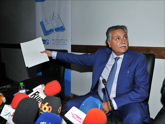‪الأمين العام لحزب التقدم والاشتراكية نبيل بن عبد الله لحظة تقديم برنامج حزبه‬ (الجزيرة)