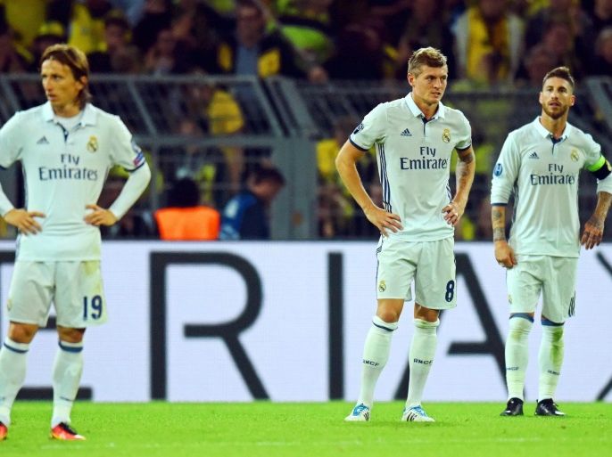 Real Madrid players (L-R) Luka Modric, Toni Kroos, and Sergio Ramos after the UEFA Champions League group F soccer match between Borussia Dortmund and Real Madrid in Dortmund, Germany, 27 September 2016. The match ended 2-2.