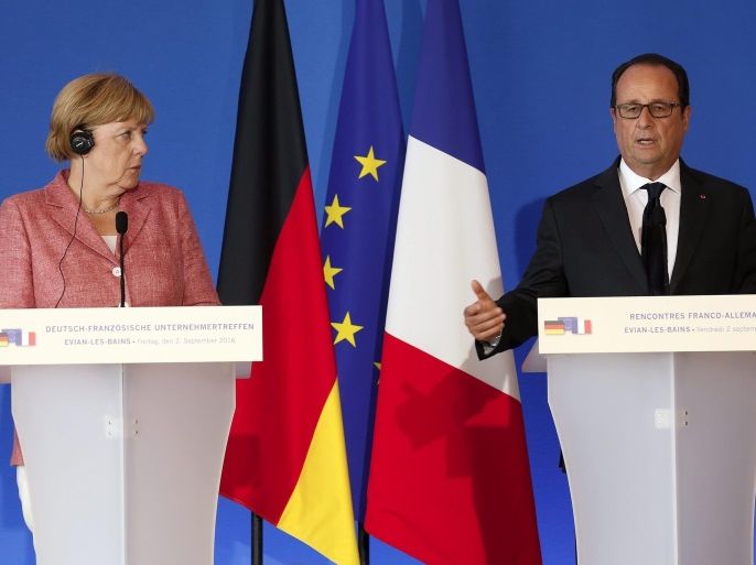 German Chancellor Angela Merkel (L) and French President Francois Hollande (R) hold a press conference during the 25th Evian Franco-German meeting in Evian-les-Bains, France, 02 September 2016.