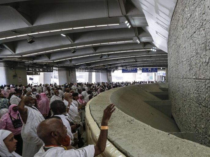Muslim pilgrims perform Jamraat al-A'qabah (stoning of the devil ritual), at Jamraat near the tent city of Mina, outside the Holy City of Mecca, Saudi Arabia, 12 September 2016. After two nights in Mina pilgrims wil return to Mecca to perform a third tawaf, around the al-Kaaba to bid farewell to the holy city. With these rituals, pilgrims believe they will go back home as pure as the day they were born.