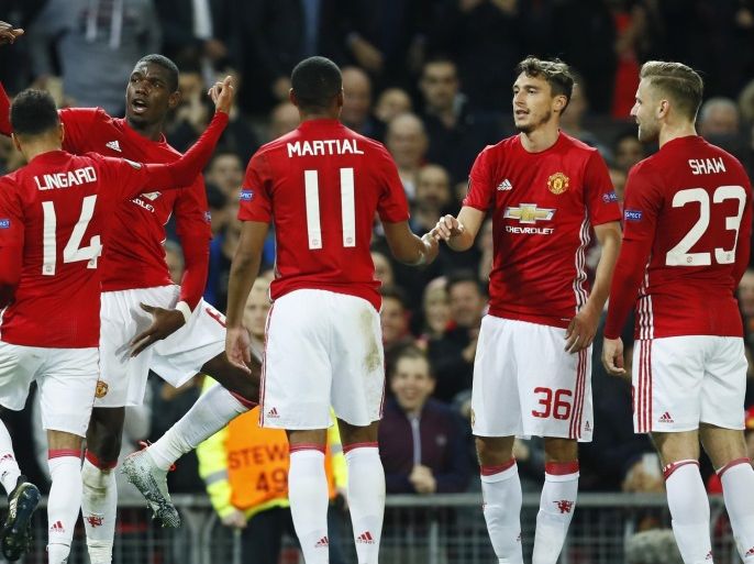 Britain Football Soccer - Manchester United v Fenerbahce SK - UEFA Europa League Group Stage - Group A - Old Trafford, Manchester, England - 20/10/16 Manchester United's Paul Pogba celebrates scoring their third goal with teammates Action Images via Reuters / Jason Cairnduff Livepic EDITORIAL USE ONLY.