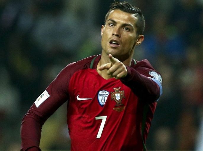 Portugal´s Cristiano Ronaldo celebrates after scoring a goal against Andorra during their FIFA World Cup 2018 Group B qualifying soccer match, held in Aveiro, Portugal, 7 October 2016.