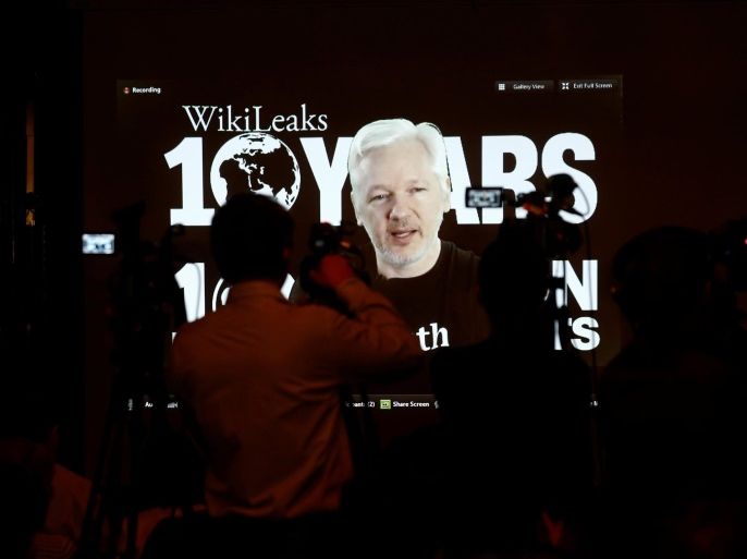 Julian Assange, Founder and Editor-in-Chief of WikiLeaks speaks via video link during a press conference on the occasion of the ten year anniversary celebration of WikiLeaks in Berlin, Germany, October 4, 2016. REUTERS/Axel Schmidt