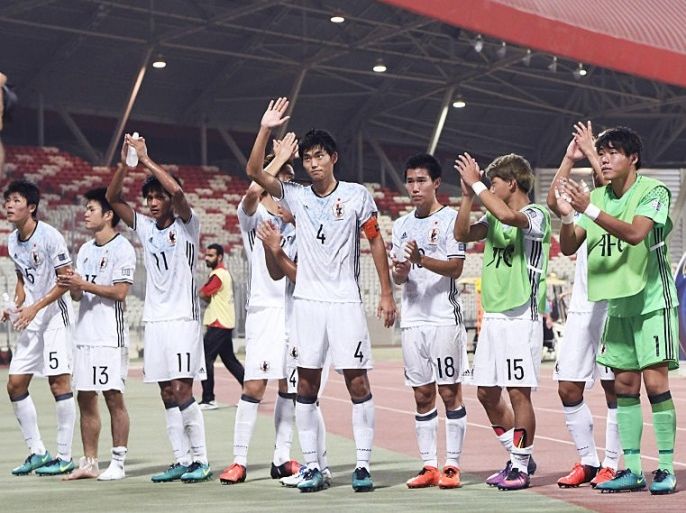 pan players celebrate after their 3-0 semifinal win over Vietnam in the Asian Under-19 Championship in Manama, Bahrain, on Oct. 27, 2016. Having already secured a spot for the 2017 U-20 World Cup in South Korea, Japan will face Saudi Arabia in the final on Oct. 30. (Photo by Kyodo News via Getty Images)