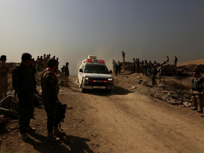‪قوات بشمركة كردية في بلدة نويران قرب الموصل‬ (رويترز)