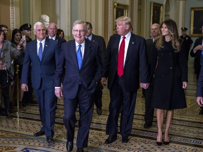 US President-elect Donald Trump (2R), his wife Melania Trump (R), Vice President elect Mike Pence (L) and Senate Majority Leader Mitch McConnell (2L) walk to a meeting in the Majority Leaders office in the US Capitol in Washington, DC, USA, 10 November 2016. Earlier in the day President elect Trump met with US President Barack Obama and Speaker of the House Paul Ryan.