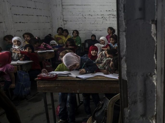 Students attend a period in al-Hayat school, rebel-held al-Qaboon, outskirts of Damascus, Syria, 19 October 2016. Al-Hayat school is the minors school in al-Qabbon, on 05 November 2014, The school was bombed from Syrian army airstrikes, at least 13 students got killed that day. A ceasefire agreement was reached after that day. The location of the school was changed to the basemant, al-Qaboon controlled by an opposition faction (Free Syrian Army), the city is currently u
