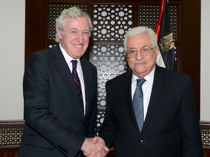 Palestinian President Mahmoud Abbas (R) shakes hands with French special envoy Pierre Vimont before their meeting, in the West Bank city of Ramallah March 15, 2016. REUTERS/Palestinian President Office (PPO)/Handout via Reuters ATTENTION EDITORS - THIS PICTURE WAS PROVIDED BY A THIRD PARTY. REUTERS IS UNABLE TO INDEPENDENTLY VERIFY THE AUTHENTICITY, CONTENT, LOCATION OR DATE OF THIS IMAGE. FOR EDITORIAL USE ONLY. NOT FOR SALE FOR MARKETING OR ADVERTISING CAMPAIGNS. THIS PICTURE IS DISTRIBUTED EXACTLY AS RECEIVED BY REUTERS, AS A SERVICE TO CLIENTS. NO RESALES. NO ARCHIVE.