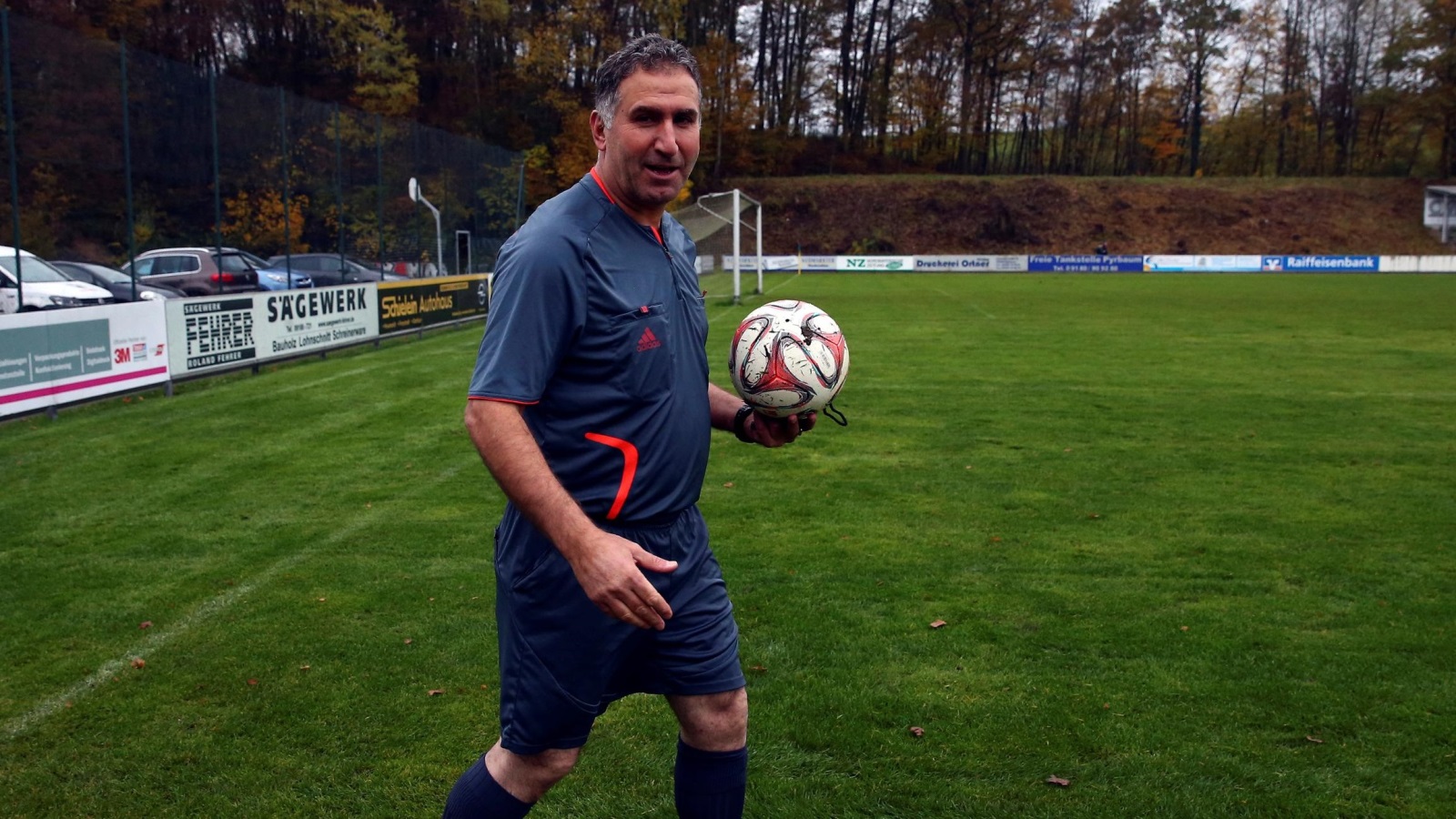 Former FIFA referee Hamdi Al Kadri conducts a German 9th division soccer match between TSV Pyrbaum and FC Altdorf in Pyrbaum, southern Germany, November 6, 2016. Picture taken November 6, 2016. Syrian migrant Al-Kadri was member of the referee team at high level FIFA matches, such as World Cup bouts before he came to Germany as a Syrian refugee. REUTERS/Michael Dalder
