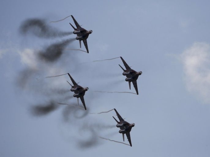 MiG-29 jet fighters of the Russian aerobatic team Strizhi (The Swifts) perform during the MAKS International Aviation and Space Salon in Zhukovsky outside Moscow, Russia, in this August 30, 2015 file photo. Russia has reinforced its military base in Armenia with fourth-generation fighter jets and a modernized helicopter, Russian news agencies cited the Russian military as saying on February 20. REUTERS/Maxim Zmeyev