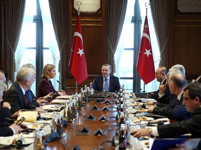A handout picture provided by Turkish President Press office shows Turkish President Recep Tayyip Erdogan (C) meets with Federica Mogherini (5-L), High Representative of the European Union for Foreign Affairs, in Ankara, Turkey, 25 January 2016. EU top officials Mogherini and Hahn are in Turkey to attend a ministerial meeting on the crises in the Middle East. EPA/TURKISH PRESIDENT PRESS OFFICE / HANDOUT