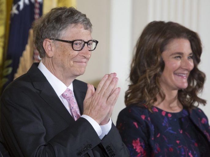 Bill Gates (L) and Melinda Gates (R), recipients of the Presidential Medal of Freedom, attend a ceremony in which they were awarded the medal by US President Barack Obama, in the East Room of the White House in Washington, DC, USA, 22 November 2016.