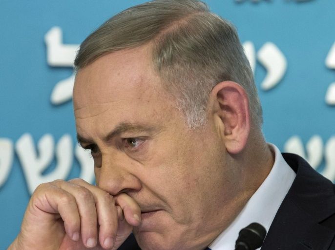 Israeli Prime Minister Benjamin Netanyahu gestures as he speaks in his Jerusalem office, 28 December 2016 following the speech of US Secretary of State John Kerry. Netanyahu spoke at length in English and slammed both Kerry speech and the Obama administration and again claimed he is doing everything possible to speak directly with the Palestinians. Netanyahu also said he looks forward to working closely with President-elect Trump when he takes office.