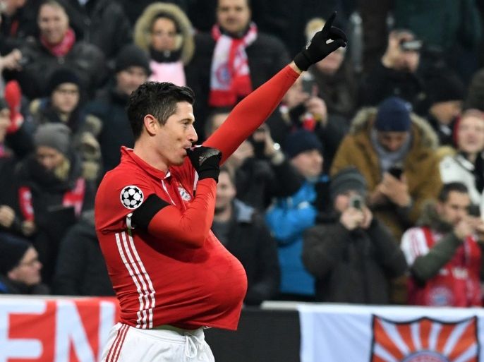 Munich's Robert Lewandowski celebrates after scoring the 1-0 goal during the UEFA Champions League group stage soccer match between Bayern Munich and Atletico Madrid at the Allianz Arena in Munich, Germany, 06 December 2016.