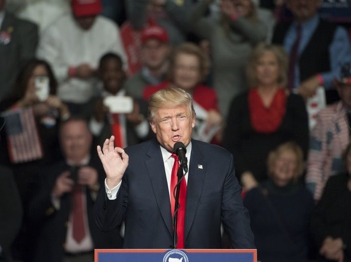 epa05677632 US President-elect Donald Trump speaks at the Giant Center in Hershey, Pennsylvania, USA, 15 December 2016, during a stop of his 'Thank You Tour' rally. EPA/TRACIE VAN AUKEN