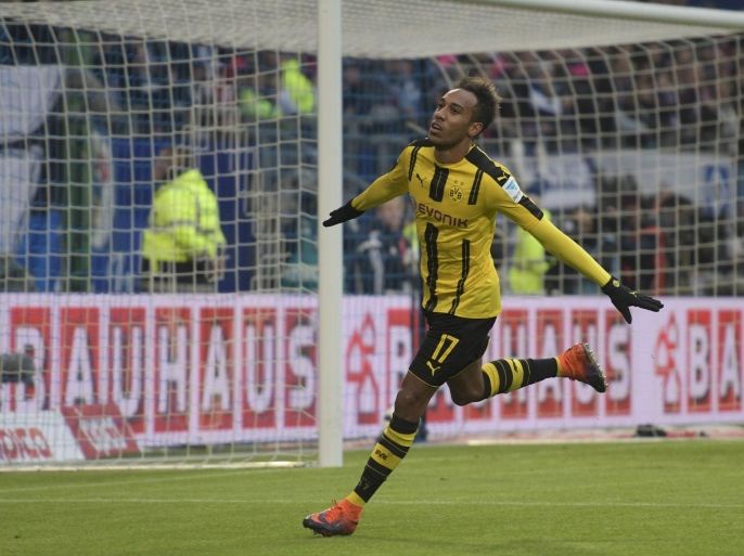 Football Soccer - HSV Hamburg v Borussia Dortmund - German Bundesliga - Volksparkstadion, Hamburg, Germany - 5/11/16 - Borussia Dortmund's Pierre-Emerick Aubameyang celebrates his goal against HSV Hamburg. REUTERS/Fabian Bimmer TPX IMAGES OF THE DAY DFL RULES TO LIMIT THE ONLINE USAGE DURING MATCH TIME TO 15 PICTURES PER GAME. IMAGE SEQUENCES TO SIMULATE VIDEO IS NOT ALLOWED AT ANY TIME. FOR FURTHER QUERIES PLEASE CONTACT DFL DIRECTLY AT + 49 69 650050