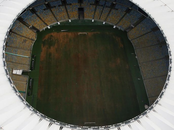 An aerial view of Maracana Stadium shows seats missing and the turf dry, worn and filled with ruts and holes in Rio de Janeiro, Brazil, January 12, 2017. REUTERS/Nacho Doce
