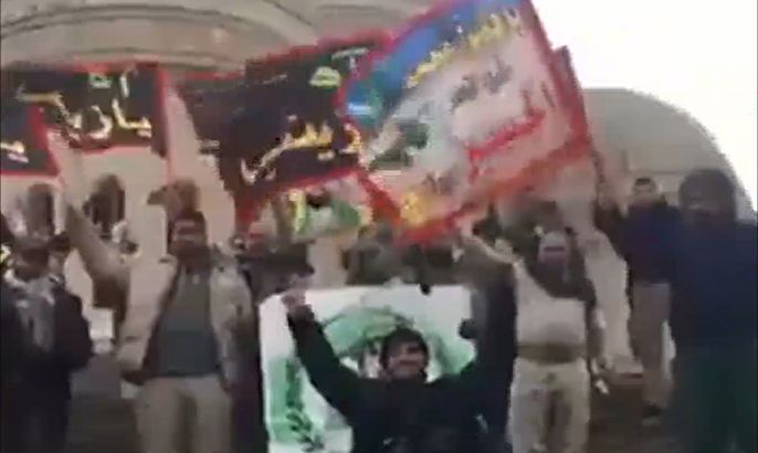 عناصر الحشد الشعبي يرددون شعارات طائفية بالموصل