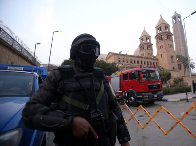An Egyptian security officer stands guard in front of the Coptic Christian cathedral complex after a bomb attack in Cairo, Egypt, 17 December 2016. At least 25 people were killed and 35 injured on 11 December 2016 in an explosion outside Cairo's Coptic Cathedral in the Abbassia neighborhood.