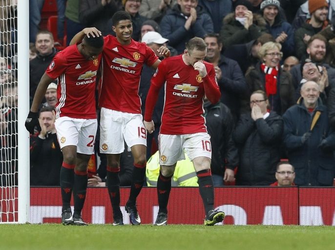 Britain Football Soccer - Manchester United v Reading - FA Cup Third Round - Old Trafford - 7/1/17 Manchester United's Marcus Rashford celebrates scoring their fourth goal with team mates Reuters / Darren Staples Livepic EDITORIAL USE ONLY. No use with unauthorized audio, video, data, fixture lists, club/league logos or "live" services. Online in-match use limited to 45 images, no video emulation. No use in betting, games or single club/league/player publications. Ple