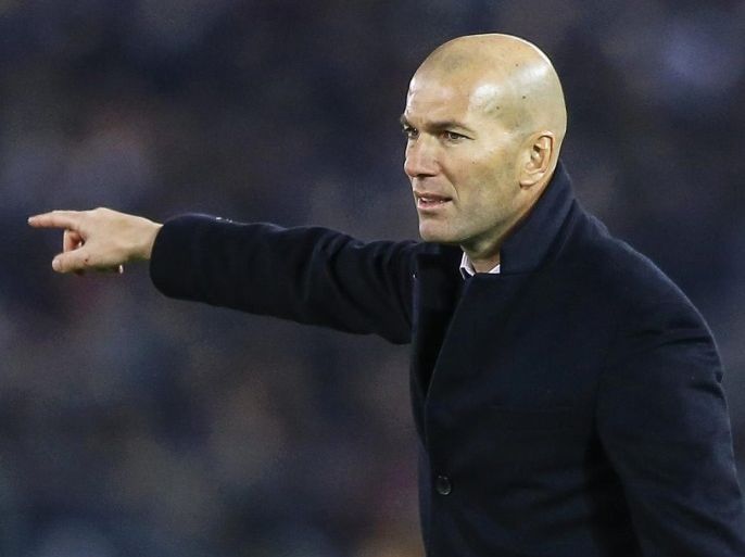 Real Madrid's head coach Zinedine Zidane reacts during the FIFA Club World Cup 2016 final between Real Madrid and Kashima Antlers in Yokohama, Japan, 18 December 2016.