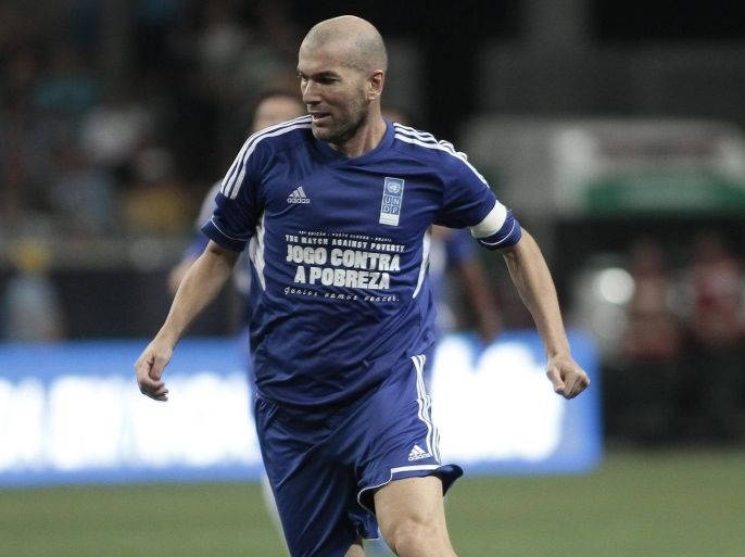 French former soccer player Zinedine Zidane in action during a match between his friends and 'Friends of Ronaldo' at the Arena do Gremio in Porto Alegre, Brasil, 19 December 2012. This is a is part of the 'match against poverty' campaign by the United Nations Development Program (UNDP).