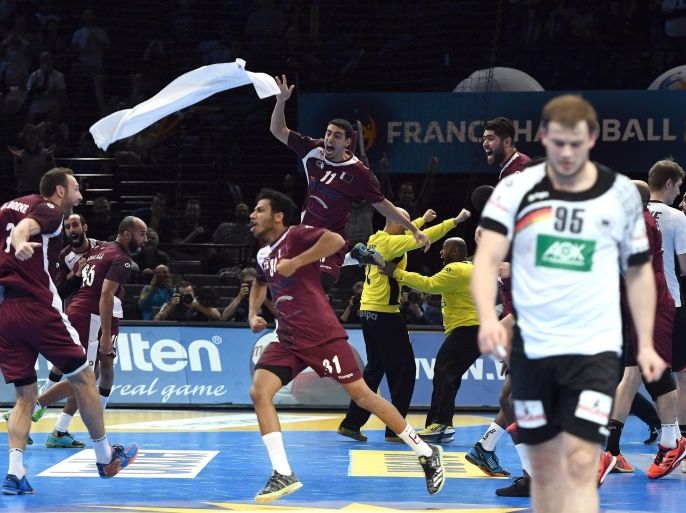 Qatar's players react after winning the round of sixteen match between Germany and Qatar at the IHF Men's Handball World Championship, Paris, France, 22 January 2017.