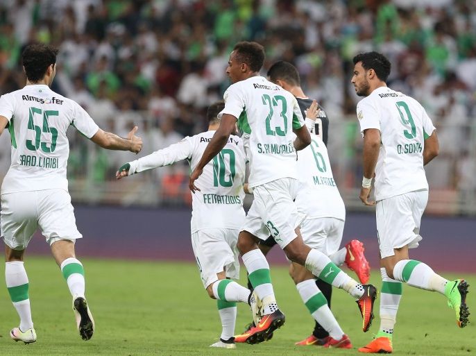 epa05755110 Al-Ahli players celebrate after scoring a goal during the Saudi Professional League soccer match between Al-Ahli and Al-Shabab at King Abdullah Al Jawhara International Stadium in Jeddah, Saudi Arabia, 27 January 2017. EPA/STR