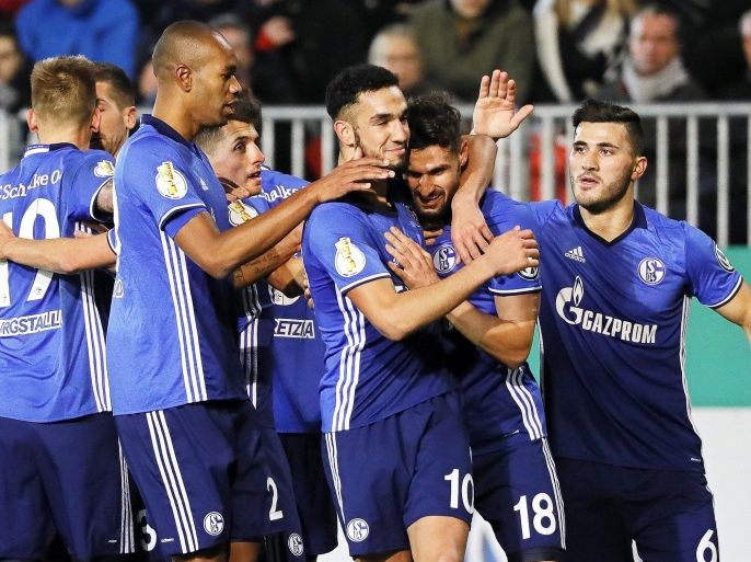 Schalke's Daniel Caligiuri (2-R) celebrates with his teammates after scoring the 2-0 lead during the German DFB Cup round of 16 soccer match between SV Sandhausen and FC Schalke 04 in Sandhausen, Germany, 08 February 2017.(ATTENTION: The DFB prohibits the utilisation and publication of sequential pictures on the internet and other online media during the match (including half-time). ATTENTION: BLOCKING PERIOD! The DFB permits the further utilisation and publication of the pictures for mobile services (especially MMS) and for DVB-H and DMB only after the end of the match.)
