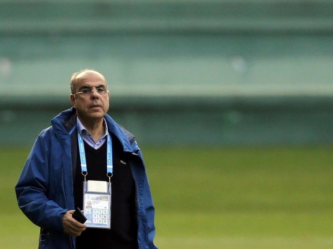 Algeria's football federation president Mohamed Raouraoua attends a training session ahead of their match against Russia at the Major Antonio Couto Pereira stadium in Curitiba June 25, 2014. REUTERS/Amr Abdallah Dalsh (BRAZIL - Tags: SPORT SOCCER WORLD CUP)