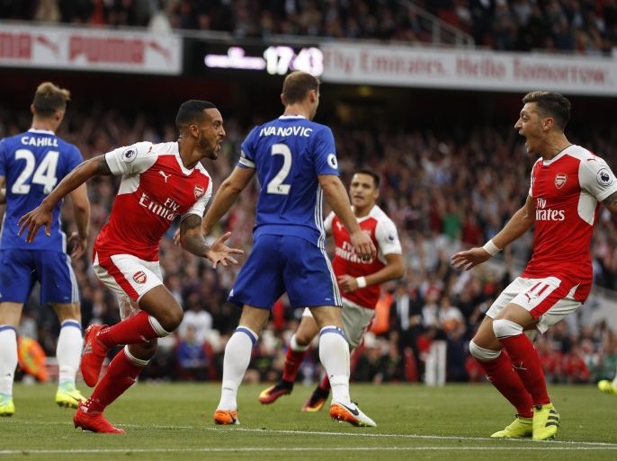 Britain Football Soccer - Arsenal v Chelsea - Premier League - Emirates Stadium - 24/9/16 Arsenal's Theo Walcott celebrates scoring their second goal Action Images via Reuters / John Sibley Livepic EDITORIAL USE ONLY. No use with unauthorized audio, video, data, fixture lists, club/league logos or "live" services. Online in-match use limited to 45 images, no video emulation. No use in betting, games or single club/league/player publications. Please contact your account representative for further details.
