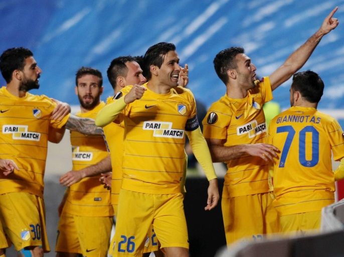 APOEL's Nicosia's players celebrate a goal during the UEFA Europa League round of 32 match between APOEL and Athletic Bilbao at GSP Stadium in Nicosia, Cyprus, 23 February 2017.