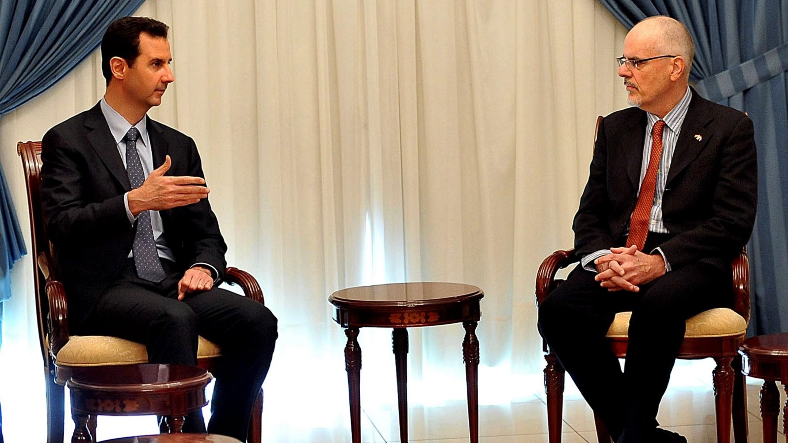 لقاء يجمع بشار الأسد بالأكاديمي الأسترالي تيم آندرسن  (وكالة الأنباء الأوروبية)