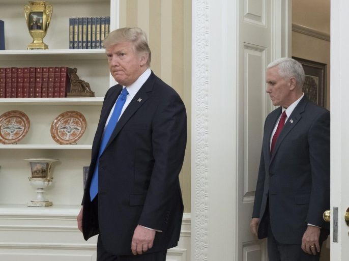 US President Donald J. Trump (L) and US Vice President Mike Pence (R) enter the Oval Office for the swearing-in of Rex Tillerson (not pictured) as US Secretary of State, at the White House in Washington, DC, USA, 01 February 2017. Tillerson was confirmed by the Senate, on 01 February, in a 56-to-43 vote to become the nation's 69th Secretary of State.