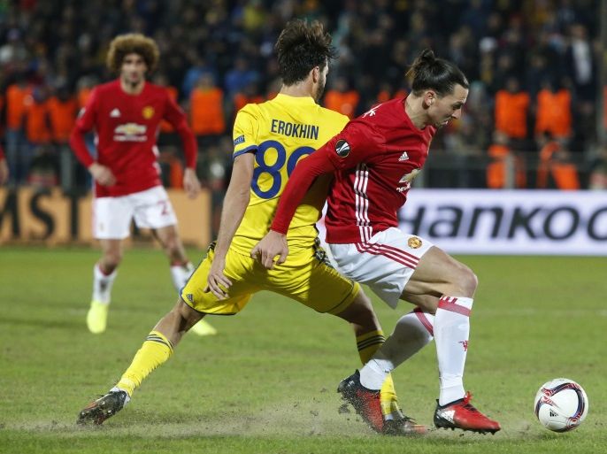 Football Soccer - FC Rostov v Manchester United - Europa League Round of 16 First Leg - Olimp-2 Stadium, Rostov-on-Don, Russia - 9/3/17 Manchester United's Zlatan Ibrahimovic in action with FC Rostov's Aleksandr Erokhin Reuters / Grigory Dukor Livepic EDITORIAL USE ONLY.